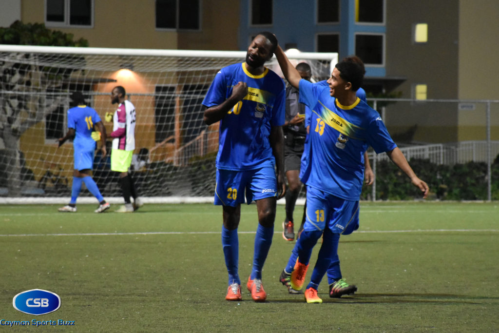 Jorge Escobar celebrates with Terrence Thomas (20) after his goal